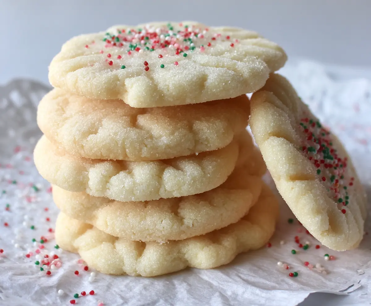 Delicious melt-in-your-mouth sugar cookies fresh out of the oven, perfect for any occasion.