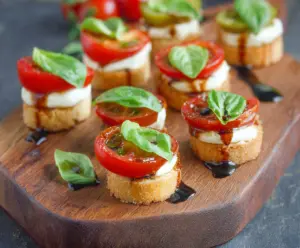 Delicious Caprese Bites with cherry tomatoes, fresh mozzarella, and basil on skewers, perfect for appetizers.
