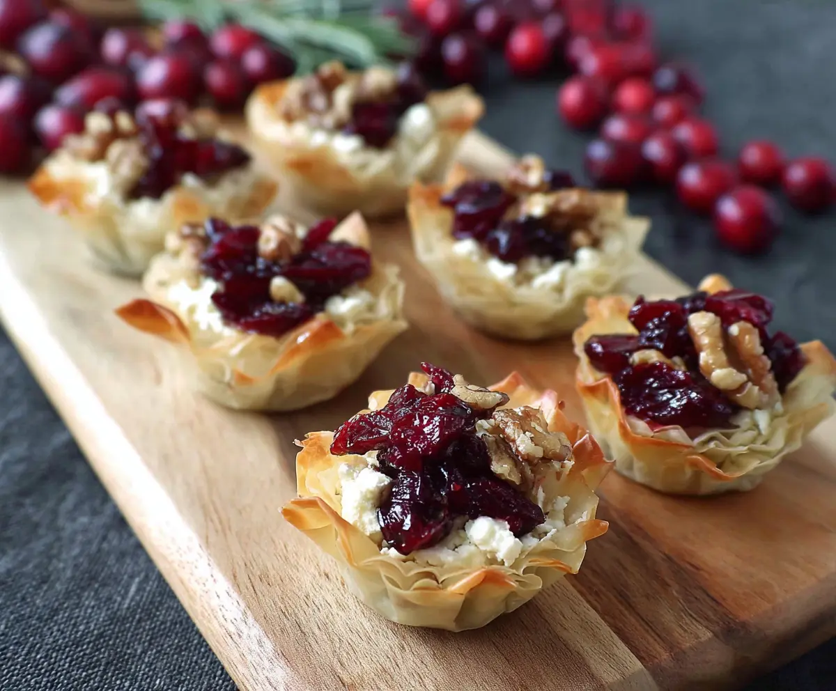 Elegant Goat Cheese Cranberry Phyllo Cups served as a delicious appetizer for parties.