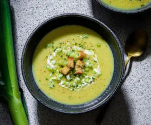 Creamy celery and leek soup served in a bowl for a healthy vegetarian meal
