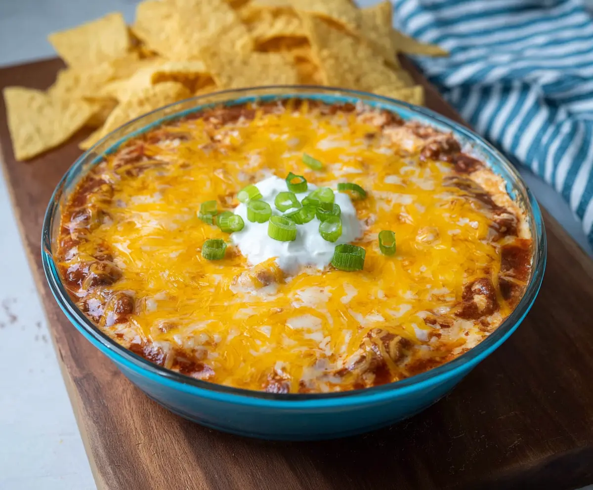 Cream Cheese Chili Dip served with fresh tortilla chips for a spicy appetizer.