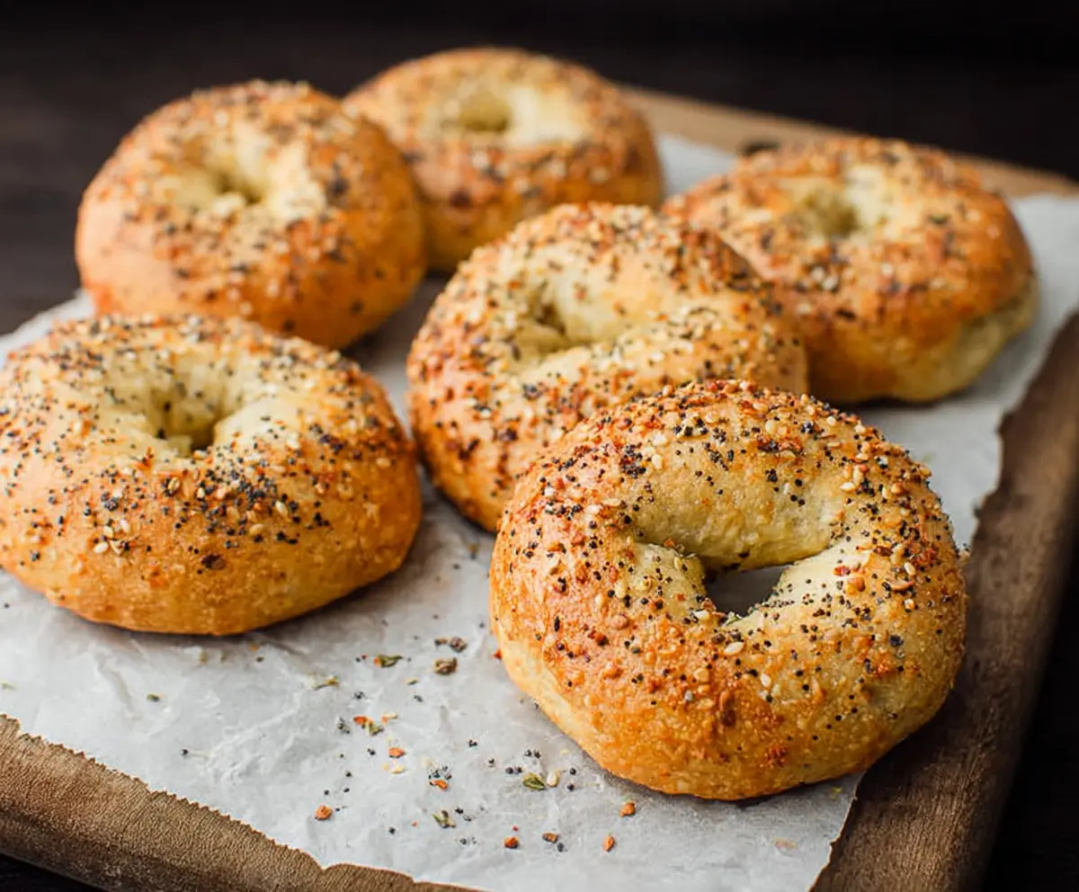 Delicious homemade keto bagels with a golden crust and topped with sesame seeds.