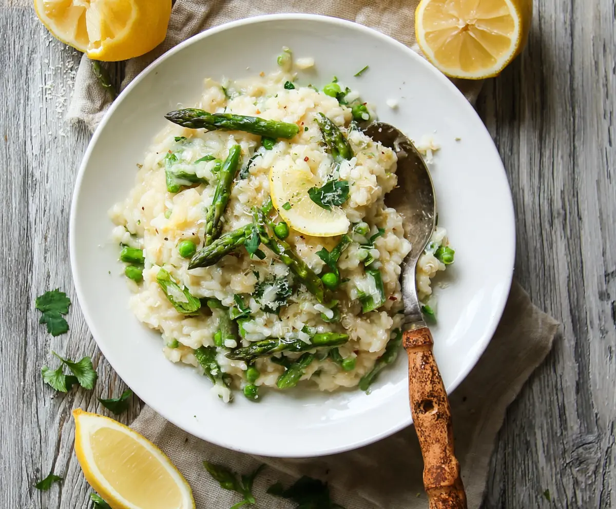 Creamy Lemon Asparagus Risotto served in a bowl, highlighting fresh green asparagus and zesty lemon flavor.